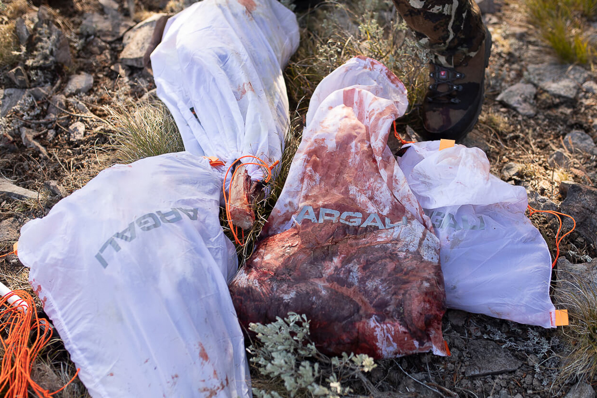Argali Game Bags filled with game meat in the field