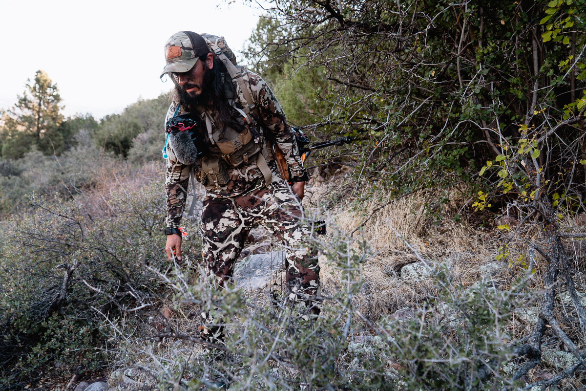 Josh Kirchner from Dialed in Hunter looking for a blood trail after shooting a bull elk